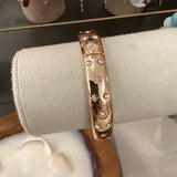 Gold and white bracelet