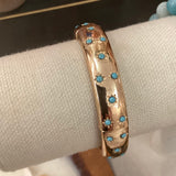 Gold and turquoise bracelet