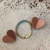 Teal and gold bracelet