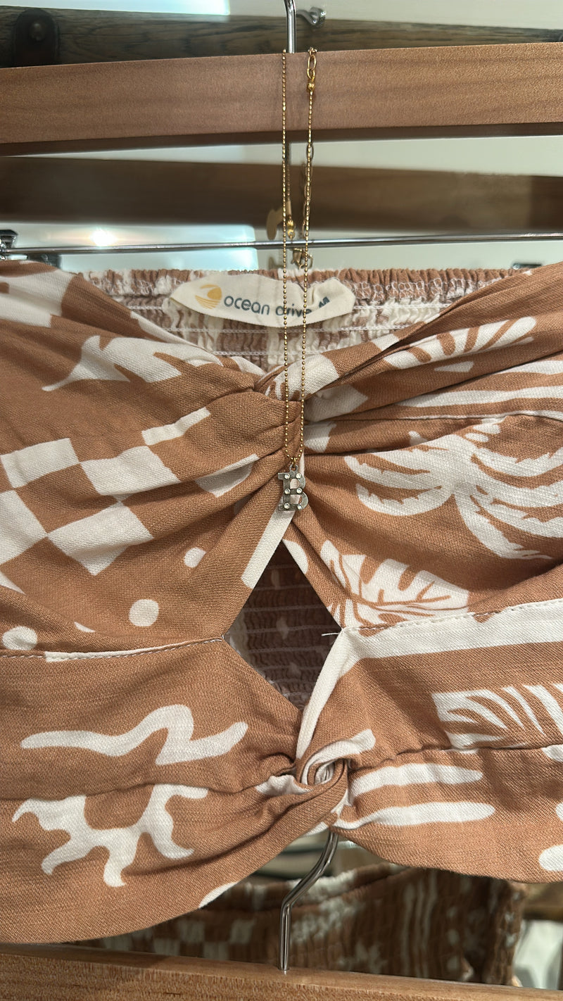 Shells, sun + waves top
