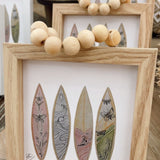 Surfboard framed art by Nicole Miller