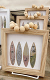 Surfboard framed art by Nicole Miller